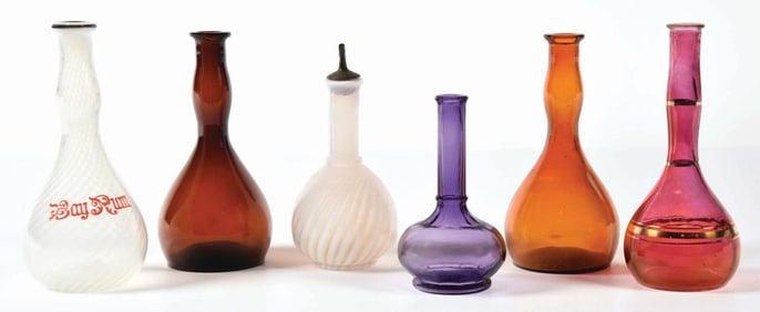 COLLECTION OF 6: DECORATIVE BARBERSHOP BOTTLES.