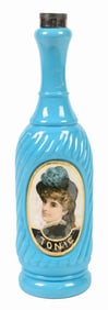 EARLY REVERSE-ON-GLASS TONIC BOTTLE.