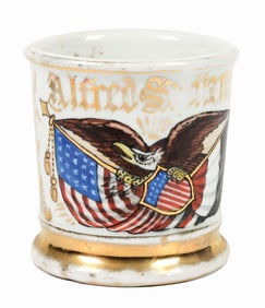 EAGLE HOLDING AMERICAN FLAG & CREST SHAVING MUG.