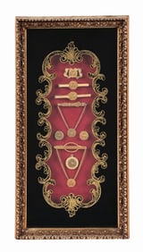 LOT OF 8: MEDALLIONS, TIE CLIPS & PINS MOUNTED IN SHADOW BOX