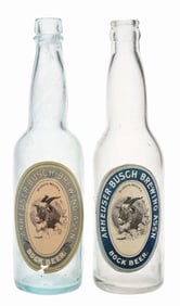 PAIR OF ANHEUSER-BUSCH GLASS BOCK BEER LABELED BOTTLES
