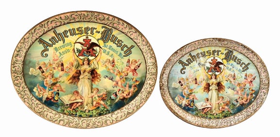 PAIR OF ANHEUSER BUSCH CHERUB TRAYS