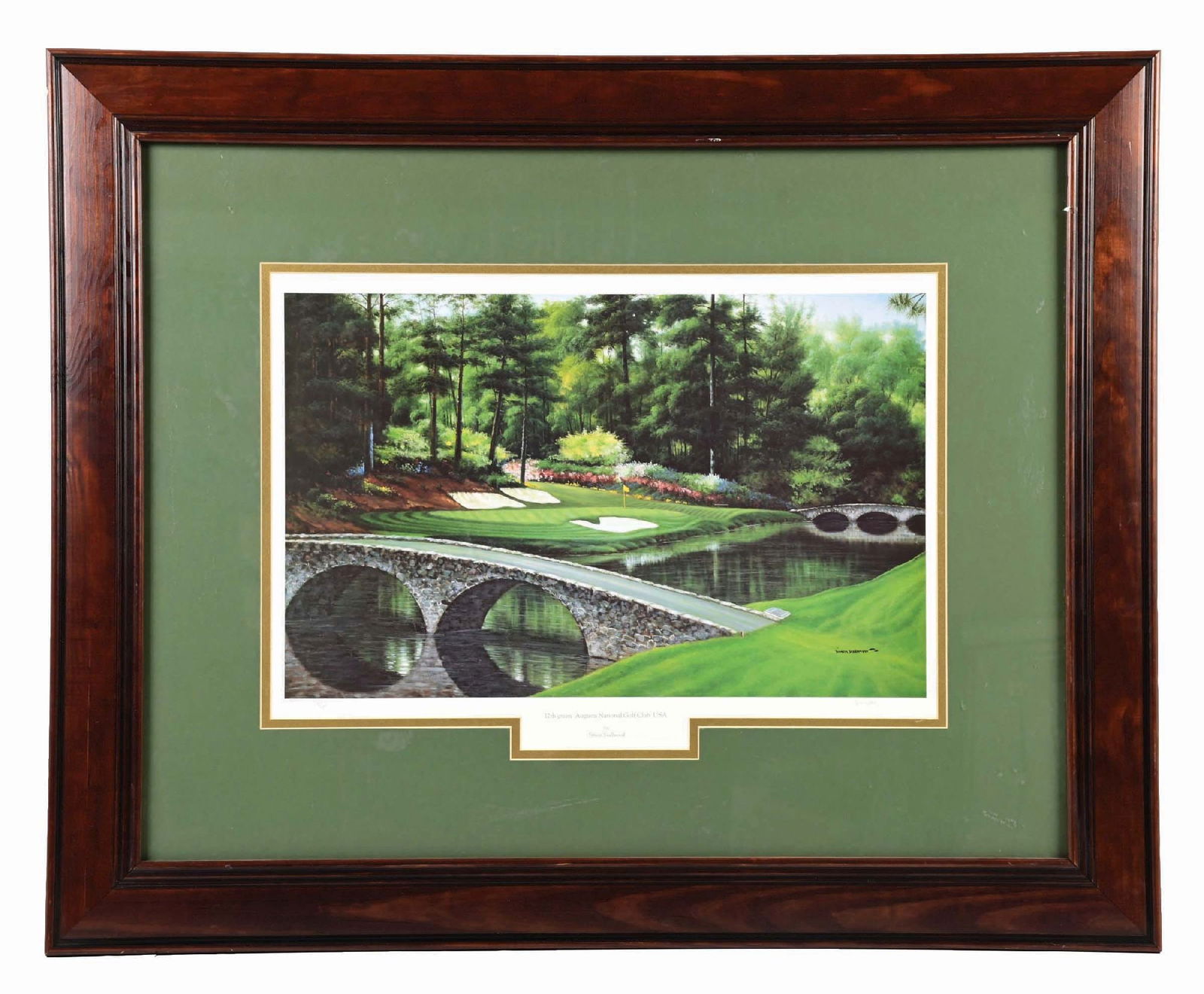 12TH GREEN AUGUSTA NATIONAL GOLF CLUB PAPER LITHOGRAPH: No. 550 out of 2,000. A clean example in a modern frame and matte. Signed by Simon Stallwood. CONDITION: It has some light wear to the wood frame. The original sticker is on the back. Condition: (9).