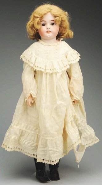 Large Simon & Halbig “Dainty Dorothy” Doll.: Bisque shoulder head incised “Germany Simon & Halbig 1080” with replaced eyes, open mouth with upper teeth, pierced ears, antique human hair wig; white kid body with rivet-jointed hips, knees and 