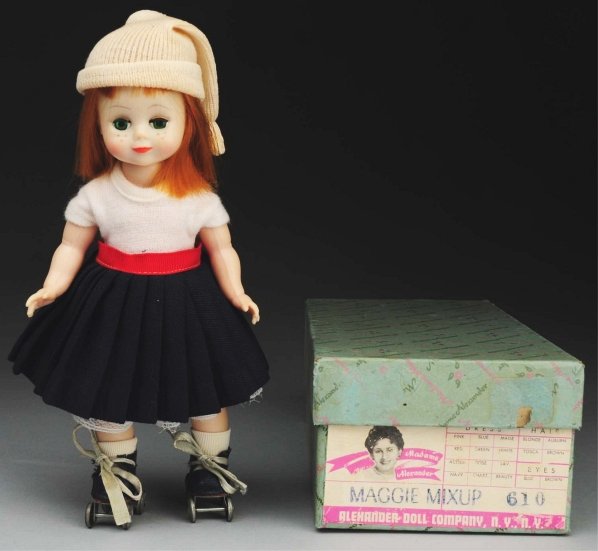 Whimsical Alexander “Maggie Mixup” Doll.: All hard plastic walker with green sleep eyes, freckles, red wig; original tagged skating outfit with panties, hat, socks, and roller skates. In original labeled box. Condition (Excellent). Size 8" T.
