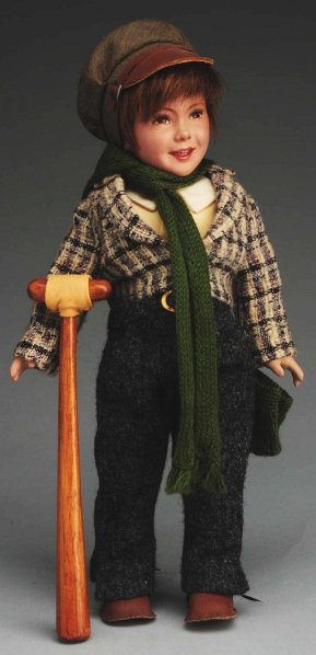 Winsome Dewees Cochran “Tiny Tim” Doll.: Latex portrait doll, signed on head “Dewees Cochran #5” with smiling mouth, brown painted eyes with real upper eyelashes, brown human hair wig; jointed shoulders and hips; original clothing with l
