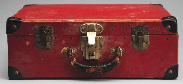 Lot of Vintage Doll Clothing.: Large straw hat, 3 pairs child’s shoes, head scarf, sun suit, 2 panties, nightgown, bathrobe, pinafore, socks, skirt, dress, jacket, all for larger dolls, in a red suitcase. Condition (Good).