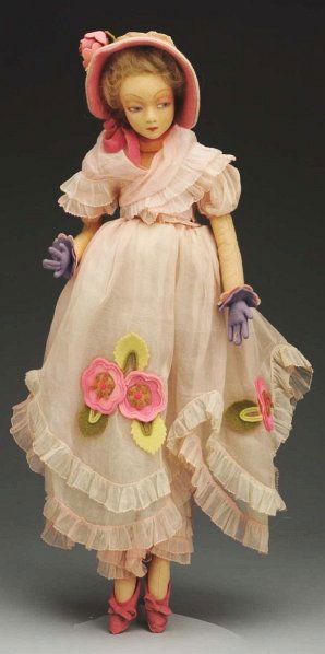 Elegant Lenci Lady Doll.: Beautiful felt face with hand-painted “bedroom” eyes, pink eye shadow, blonde mohair wig with inset hair around face; long-limbed lady body; all original organdy dress with ruffles and felt flower