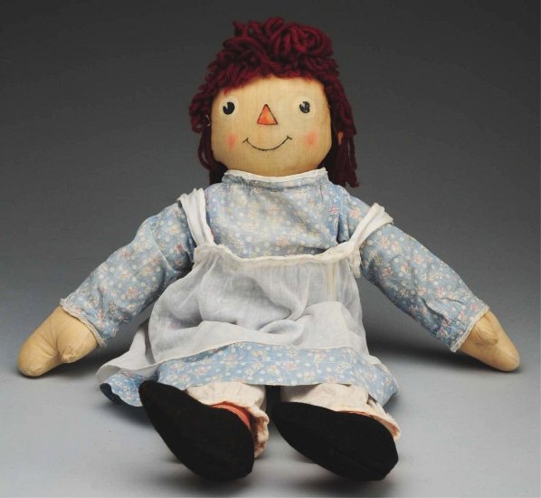 Very Rare Exposition “Raggedy Ann” Doll.: 1935, Exposition Doll & Toy Mfg. Co. All cloth with printed face, round pie-eyes, dark red yarn hair with distinctive top knot, red striped stocking legs, removable black felt shoes; original dress, a