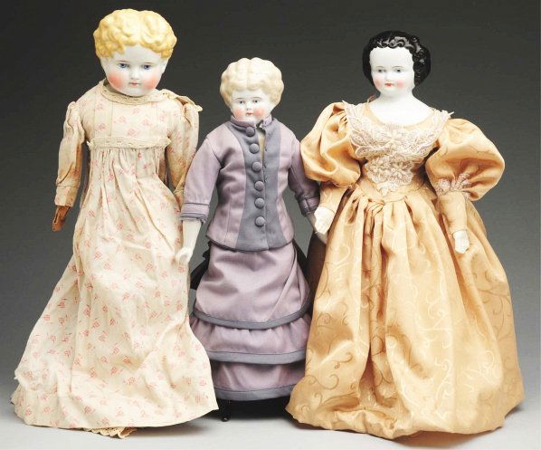 Lot of 3: German China Head Dolls.: Alt, Beck & Gottschalck blonde child with blue eyes (shoulder plate restored), antique cloth body with leather arms (wear) and stocking legs with blue leather boots (ankles weak, lots of wear on boots