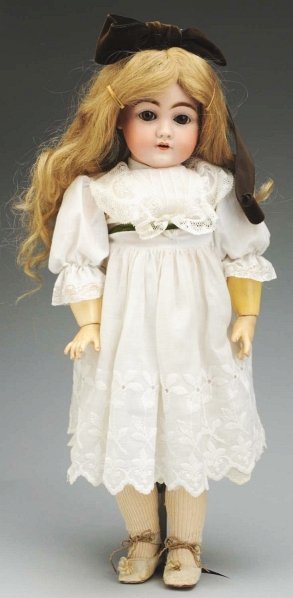 Cute Kestner Child Doll.: German bisque socket head incised “F made in Germany 10 143” made by J.D. Kestner, sleeping eyes, painted upper and lower eyelashes, multi-stroked eyebrows, open mouth with 2 upper teeth, plaster 