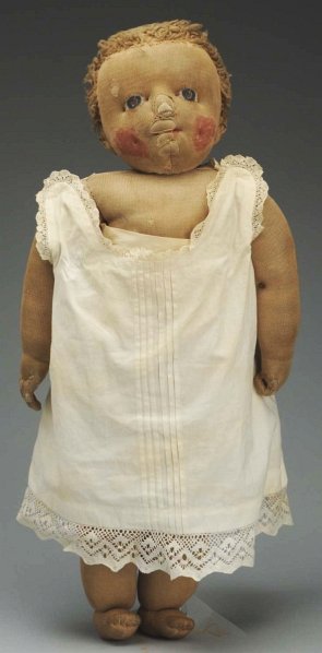 Cloth Stockinet “Missionary Rag Baby".: All stockinet made by Julia Beecher of Elmira, NY 1893-1910. Cuddly, chubby doll has been much loved with touch up on cheeks and possibly eyes, original curly wool hair, holes on nose, chin, mouth and