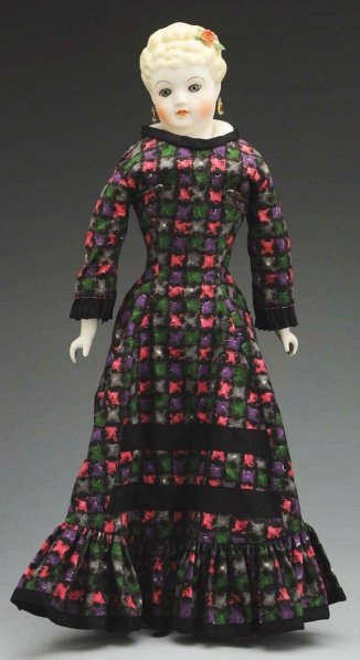 Emma Clear Parian Doll.: Signed Clear, “Margaret Rose” with blonde hair and applied rose (leaf flaked), pierced ears, glass eyes, molded collar; original cloth body with corset, Parian limbs, redressed. Condition (Excelle