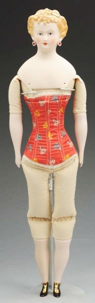 Emma Clear Parian Doll.: Signed Clear ’49, “Countess Dagmar” with blonde fancy hair, curls on forehead, gold ribbon, painted facial features, pierced ears with earrings; original cloth body with parian limbs. Condition 