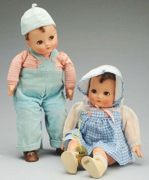 Extraordinary Pair of Effanbee Dolls.: “Katie” and “Mickey” with composition heads, lower arms and legs on cloth torsos; molded and painted brown hair, flirty lashed sleeping eyes, rosy cheeks, closed mouths; all factory original c