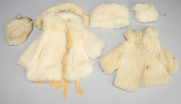 Lot of “Shirley Temple” Fur Coats.: Small coat with partial NRA tag and matching hat (some dust), larger coat and matching hat with silk lining (coat lining is deteriorating badly), fur collar and muff. Condition (Good - Excellent).