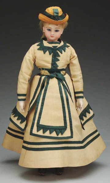 Sweet French Fashion Poupée Doll.: Bisque socket head on shoulder plate (overall light speckling) incised “Sie C 3/0” made by Jules Nicholas Steiner, an early Series C bébé head with generous dark blonde eyebrows, blue paperweigh