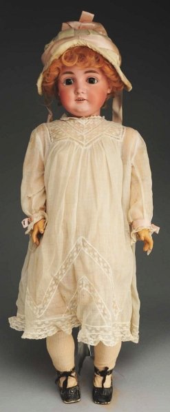 Large German Bisque Child Doll.: Socket head incised “L ¾ made in Germany 15 ¾ 164” by J.D. Kestner, eyes (eye flake on bottom lid), molded eyebrows, open mouth with teeth, replaced mohair wig, plaster pate; original Kestner bo