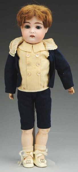 Charming German Bisque Child Doll.: Socket head incised “C” probably by Cuno & Otto Dressel, multi-stroked eyebrows, sleeping eyes, open mouth with upper teeth, chin dimple, human hair wig; original jointed composition body with ori