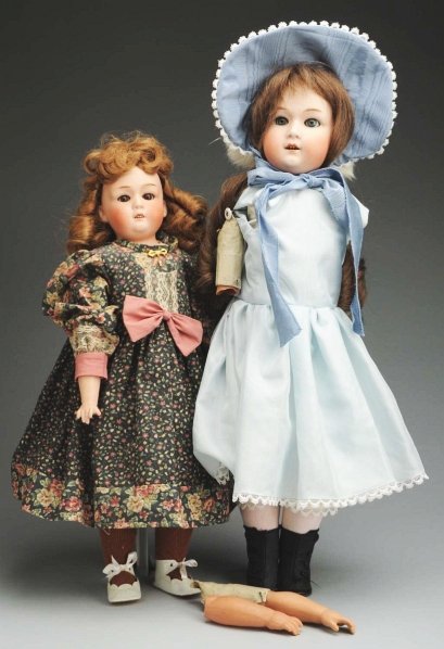 Lot of 2: Heubach “Dainty Dorothy” Dolls.: Bisque shoulder heads incised “10633 Gebruder Heubach” sleeping eyes, open mouths with upper teeth, replaced wigs; white kid bodies with rivet joints and composition lower arms and legs (wear, one
