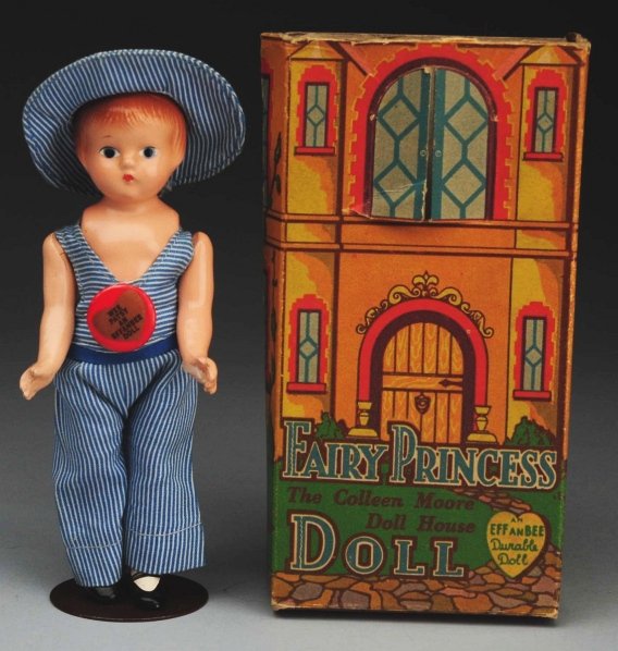 Boxed Effanbee “Wee Patsy".: All composition fully marked, molded hair, painted eyes; jointed shoulders and hips (arms need to be reattached), painted shoes and stockings; original outfit with hat and pin back button; in original