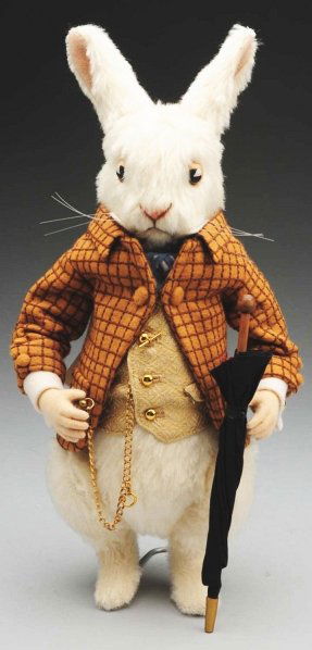 John Wright “White Rabbit".: From the “Alice in Wonderland” Series, “The White Rabbit” made from white mohair, original clothing with label, no box or certificate. Condition (Excellent). Size 13" T.