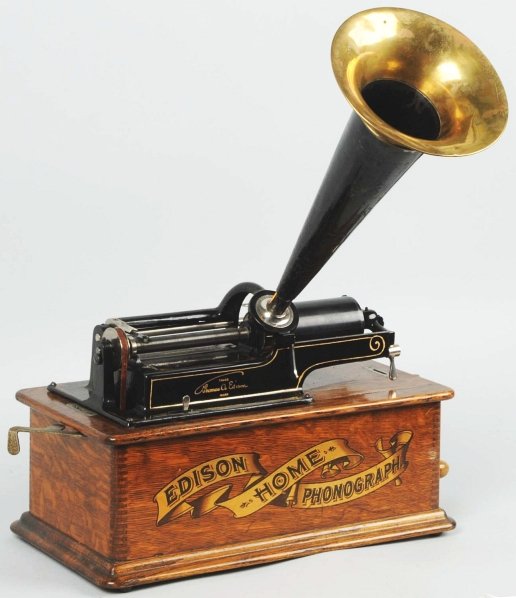 Edison Home Phonograph.: Exceptionally clean. Works well. Has a metal horn with a brass tip. Condition (Excellent). Size 16" x 12".
