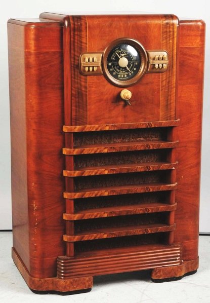Zenith Floor Radio.: Appears to be all original including buttons. Minor scratches. Art deco design. Working condition. Condition (Excellent). Size 41 - 1/2" T.