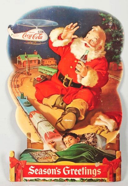 Christmas "Coca-Cola' Die-Cut Standee.: 1960s. Classic scenes with boy sleeping as train runs around track and toy helicopter check out Santa Claus sitting in center of train track. Condition (Excellent). Size 48" T.