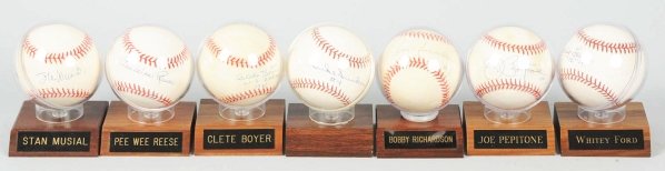 Lot of 7: Autographed Baseballs.: Autographs include HOFers Stan Musial, Pee Wee Reese, Whitey Ford, and Duke Snider. Also includes Clete Boyer marked "World Series Champs 1961", Joe Pepitone, and Bobby Richardson. All have name plaqu