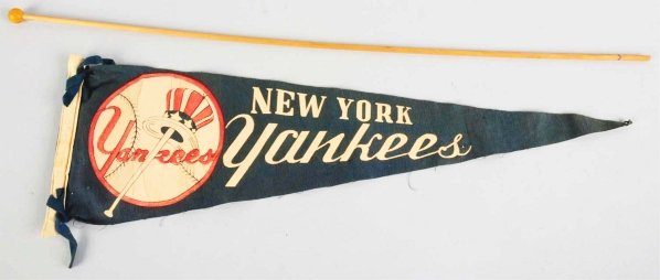 New York Yankee Pennant.: 1930s. Includes original wood holder. Condition (Excellent). Size 30 - 1/2" L.