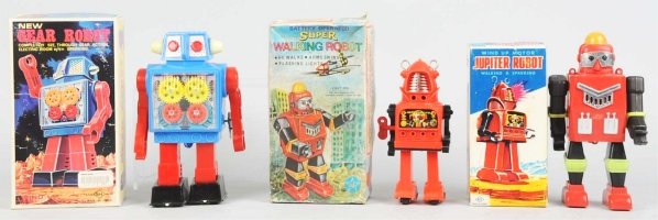 Lot of 3: Robot Toys.: Includes one plastic and tin litho wind-up Jupiter Robot made by Yoshiya. Working. Includes original box and inserts with one split to box face. Also includes one plastic battery-operated Super Walkin