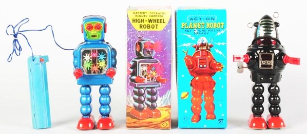 Lot of 2: Tin Litho & Painted Japanese Toys.: Includes painted tin wind-up Action Planet Robot made by Yoshiya. Working. Includes original box with original inserts. Also includes a tin litho and painted battery-operated High Wheel Robot made by 