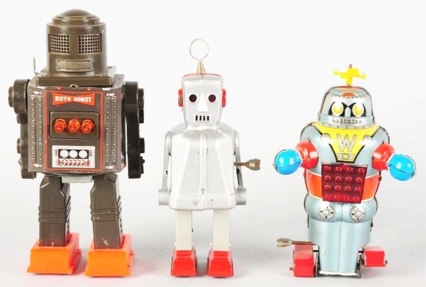 Lot of 3: Tin Japanese Toys.: Includes tin litho and plastic battery-operated Roto Robot made by Horikawa (working) with some oxidation to chrome mouth and painted tin wind-up Sparky Robot made by Yoshiya (working) with some flaki