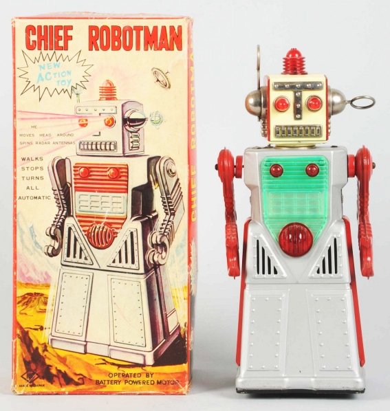 Tin Litho Battery-Operated Chief Robot Man.: Japanese. Made by KO Yoshiya. Working. One glue-repaired tab on shoulder. Includes original box with taped corners on inside, one puncture to face, one small tear on one of the side panels, and one sm