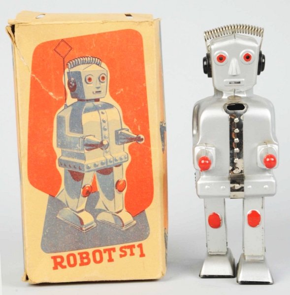 Painted Tin Wind-Up Robot ST1.: German. Working. One slight rub to one of the back shoulders. Includes original box with some tear repairs, one missing inner flap on one end, and only a partial outer flap on that same end. Toy (Exce