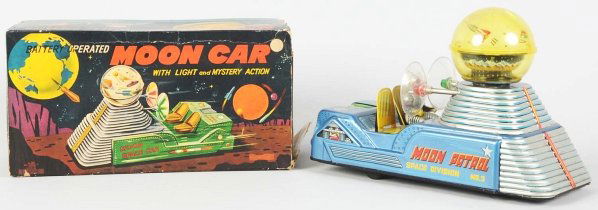 Tin Litho Battery-Operated Moon Car.: Japanese. Made by Nomura. Working. Astronaut's dome is missing the tip, crazing throughout the toy, and inside of battery box has some rusting. Also, the globe is cracked in several spots and has a ho