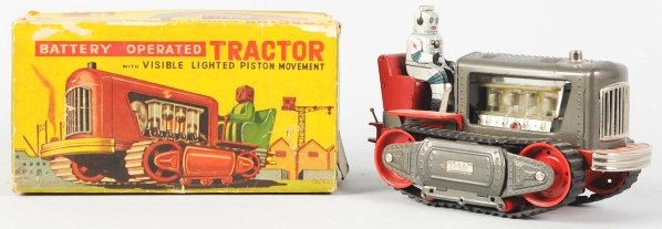 Tin Litho & Painted Robot Tractor.: Japanese. Made by Showa. Battery-operated and working. Antenna on robot is a very well-done replacement. Includes original box with some corner tears and some punctures in the face. Toy (Excellent) Bo