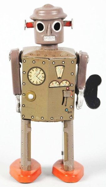 Tin Litho Wind-Up Atomic Robot Man.: Japanese. Tin arm version. Working. Some glue residue on back. Condition (Excellent - Near Mint). Size 5" T.
