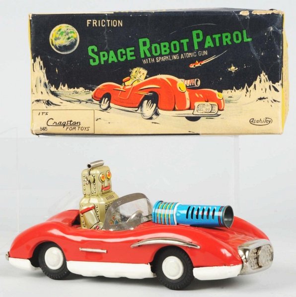 Tin Litho & Painted Space Robot Driving Mercedes.: Japanese. Made by Asahitoy. Friction mechanism is working. Includes original box with some paper loss to upper right-hand edge and creasing throughout. Toy (Near Mint) Box (Excellent). Size 8 - 1/4" L
