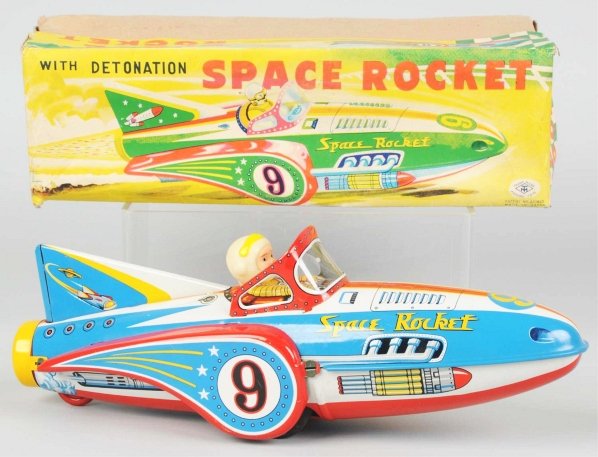 Tin Litho Friction Space Rocket No. 9.: Japanese. Made by Modern Toys. Working. Some slight crazing and very minor scratches to bottom. Includes original box with some corner tear repairs. Toy (Excellent - Near Mint) Box (Very Good). Size 1