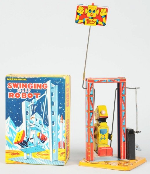 Tin Litho & Painted Wind-Up Swinging Baby Robot.: Japanese. Made by Yone. Working. Includes original box. Condition (Near Mint). Size 11 - 1/2" T.