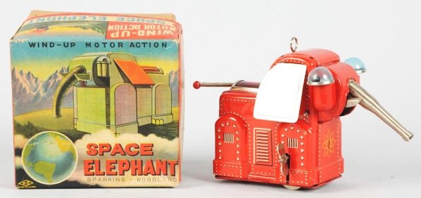 Tin Litho Wind-Up Space Elephant.: Japanese. Made by Yoshiya. Working but does not spark. Includes original box. Condition (Near Mint). Size 5 - 1/2" L.