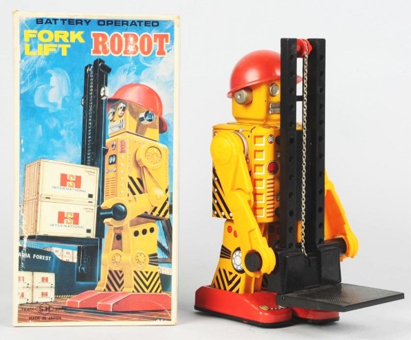 Tin Litho Battery-Operated Forklift Robot.: Japanese. Made by Korikawa. Working. Includes original box with inserts and cardboard crate. Condition (Excellent - Near Mint). Size 12" T.
