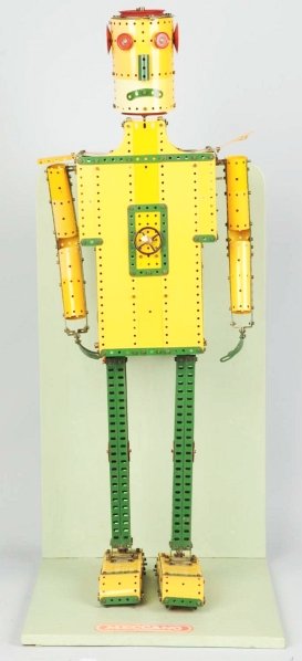 Meccano Robot Store Display.: English. Made of tin plates that have been screwed together. Has not been tested because there is not battery unit to plug it into. Comes with the original stand. Some scratching on the neck plate. Co