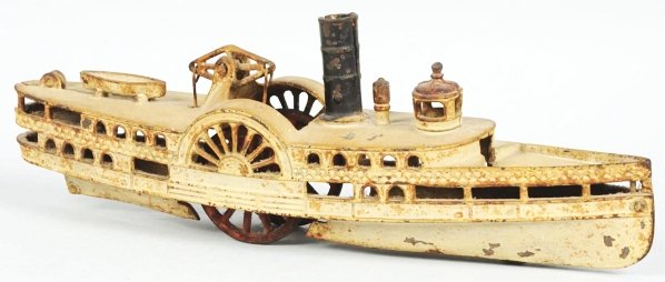 Cast Iron Paddlewheel Boat Toy.: American. Probably Wilkins. Large size variation. Faint lettering can be seen under paddlewheels and is marked "State of New York". Could have some old over-painting and also has some paint chipping a