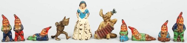 Lot of 10: Early Cast Iron Figures.: Includes one Snow White, one Pluto playing an accordion, one Felix the Cat marked "Felix" across stomach (possibly made by Dent), and seven gnomes. Some chipping and paint loss throughout. Condition (