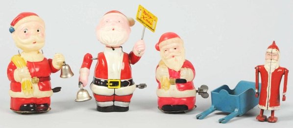 Lot of 4: Small Santa Claus Toys.: Includes two celluloid wind-ups in good working condition, one metal walking Santa pushing a cart and one tin wind-up in good working condition. Condition (Excellent). Size Largest: 5" L.