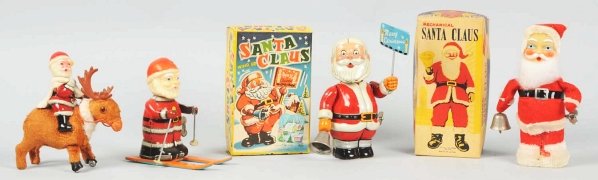 Lot of 4: Santa Claus Wind-Up Toys.: Two are in original boxes. One is Santa on reindeer and other is Santa on skis. In working condition. Condition (Excellent). Size Largest Box: 7" T.