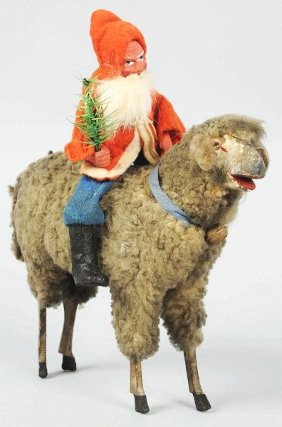 Santa Riding Rare Black Sheep.: Sheep has glass eyes, blue collar, brass bell, leather ears, and wonderful looking and feeling heavy wool coat. Santa holds a feather tree. Condition (Excellent). Size 10" T.